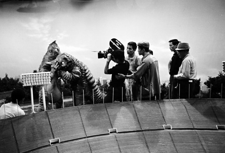 Tsuburaya Eiji (far right) overseeing the special effects studio while filming Demons Rise Again, episode 19 of Ultraman  © TSUBURAYA PRODUCTIONS